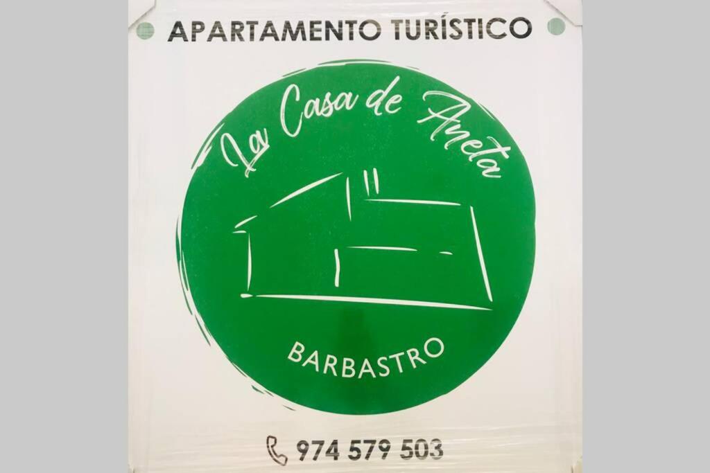 a green circle with the number six on it at La casa de Aneta in Barbastro