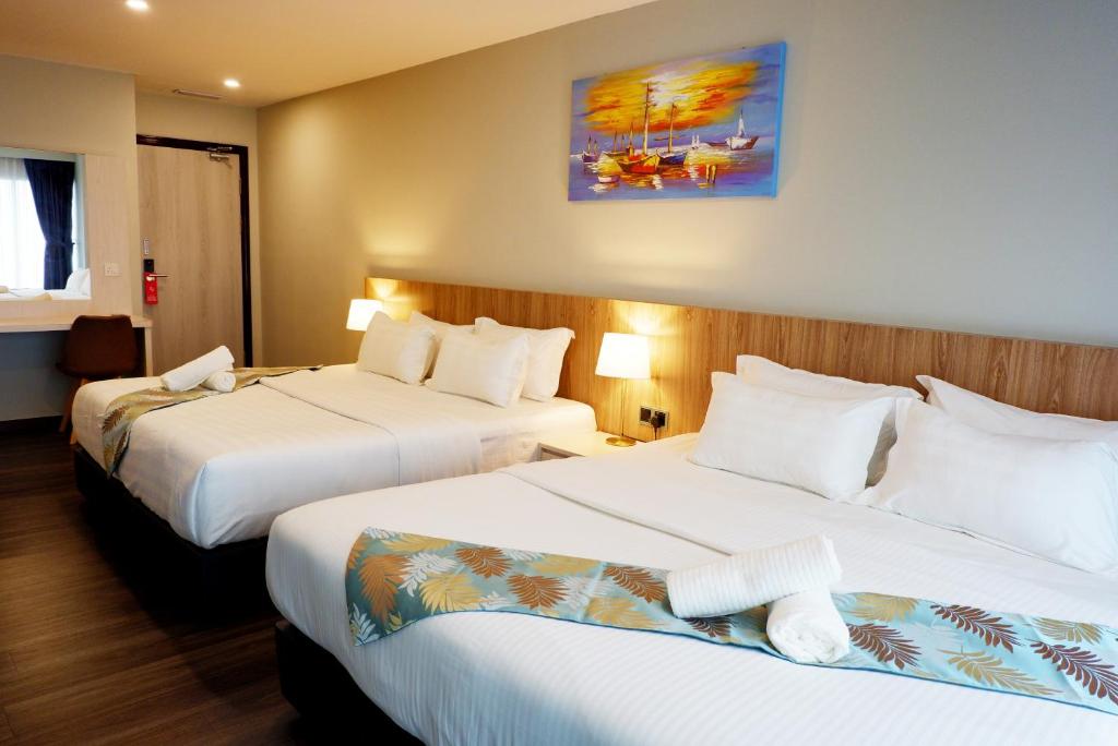 Postel nebo postele na pokoji v ubytování FLYPOD Hotel