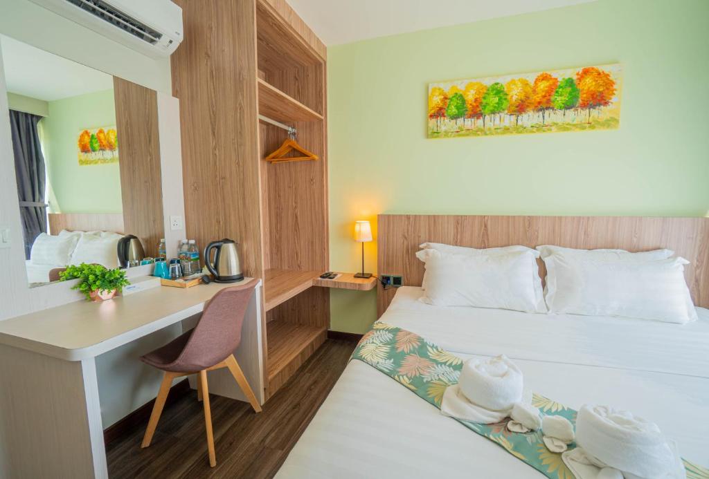 Postel nebo postele na pokoji v ubytování FLYPOD Hotel