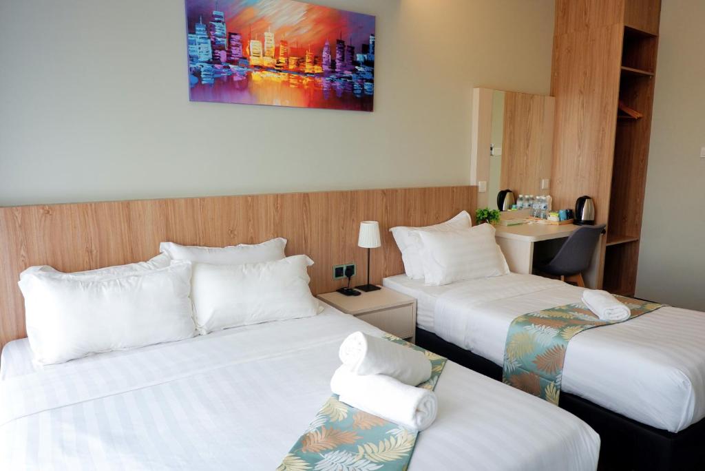 Postel nebo postele na pokoji v ubytování FLYPOD Hotel
