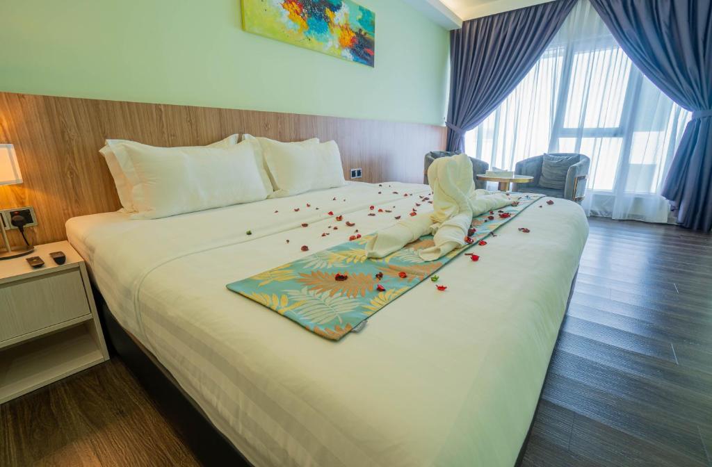 Postel nebo postele na pokoji v ubytování FLYPOD Hotel