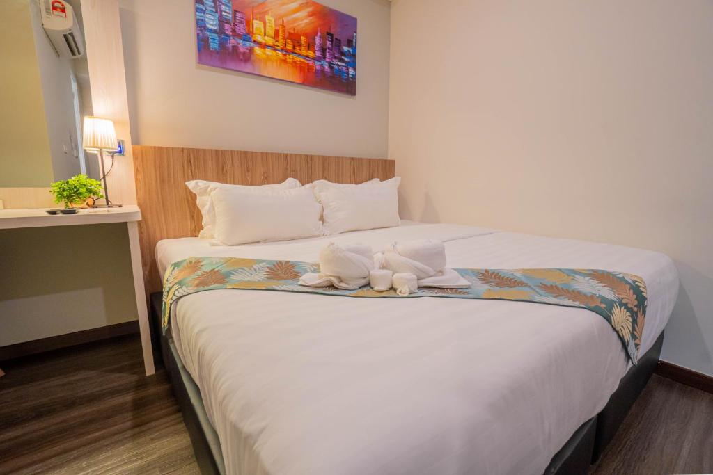 Postel nebo postele na pokoji v ubytování FLYPOD Hotel