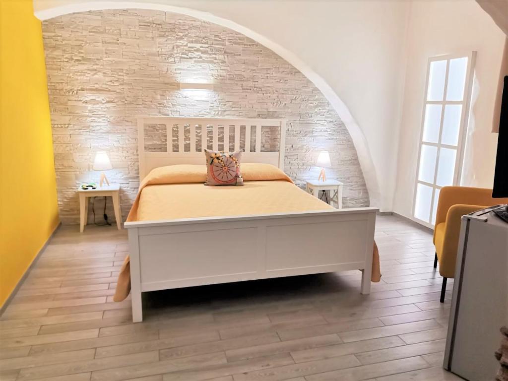 Postel nebo postele na pokoji v ubytování DG Sicily