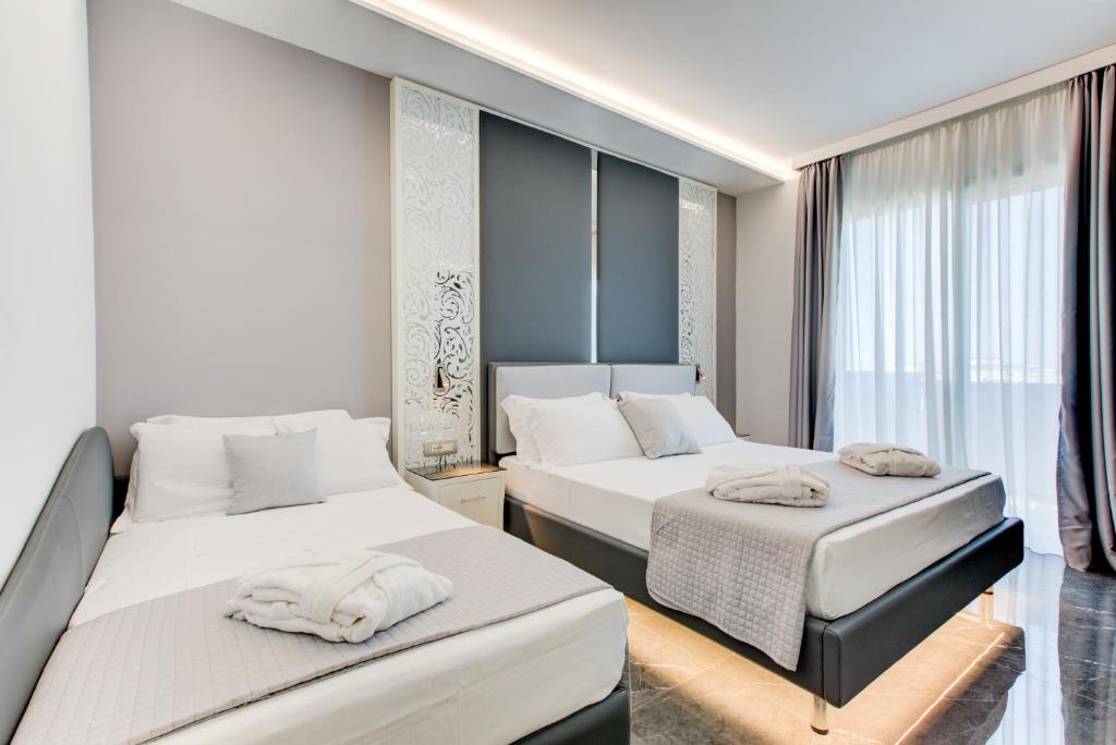 Postel nebo postele na pokoji v ubytování Hotel Due Mari & SPA