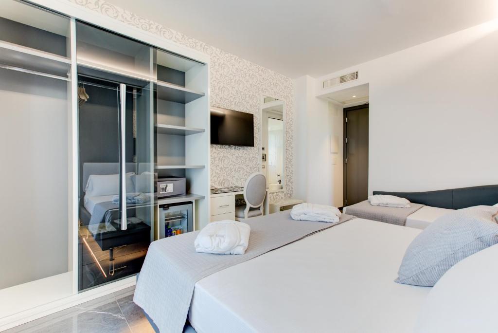 Postel nebo postele na pokoji v ubytování Hotel Due Mari & SPA