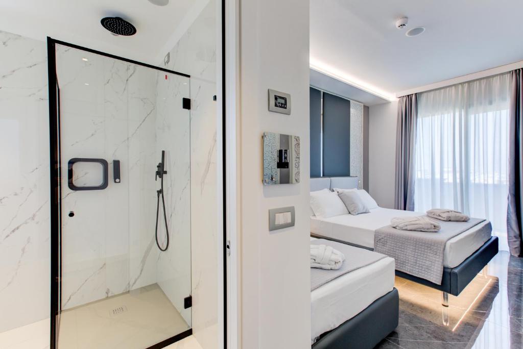Katil atau katil-katil dalam bilik di Hotel Due Mari & SPA