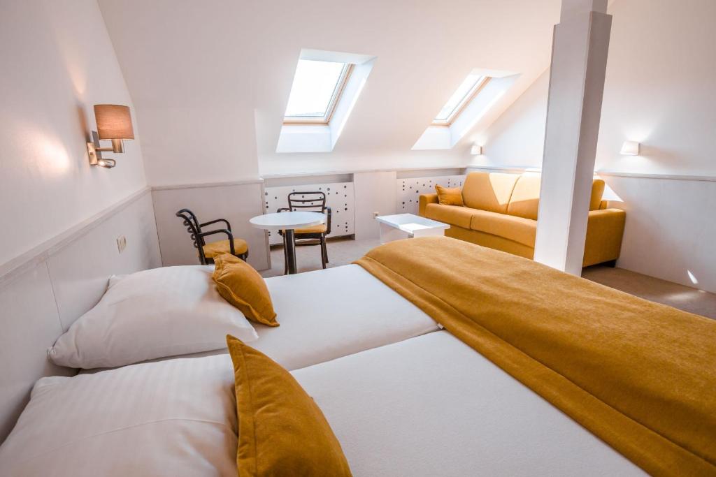 Postel nebo postele na pokoji v ubytování Hotel Olberg