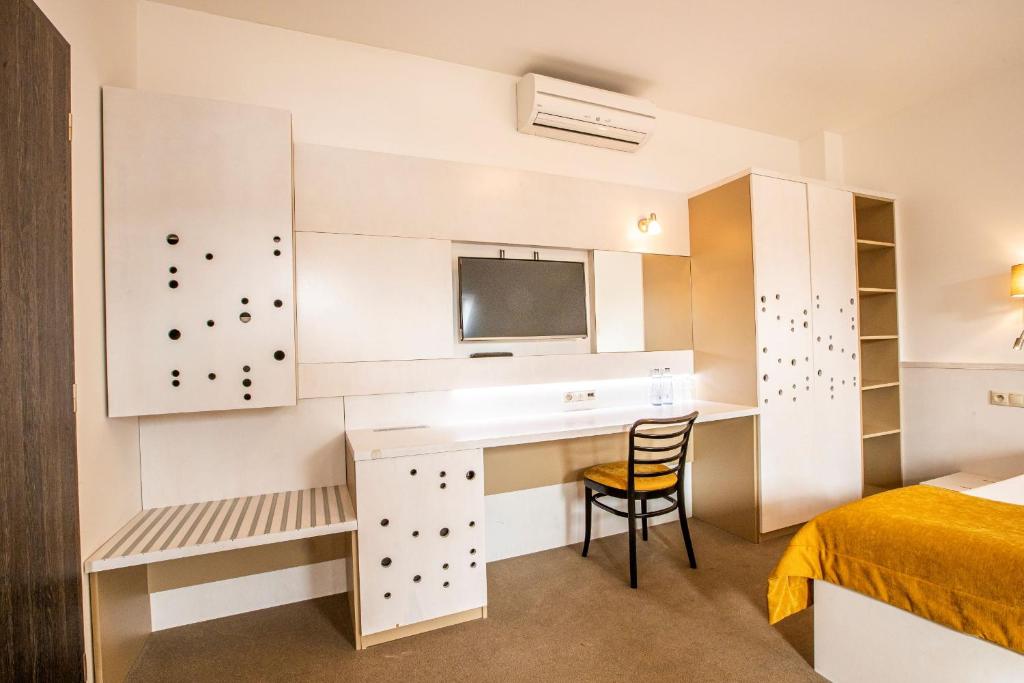 Postel nebo postele na pokoji v ubytování Hotel Olberg