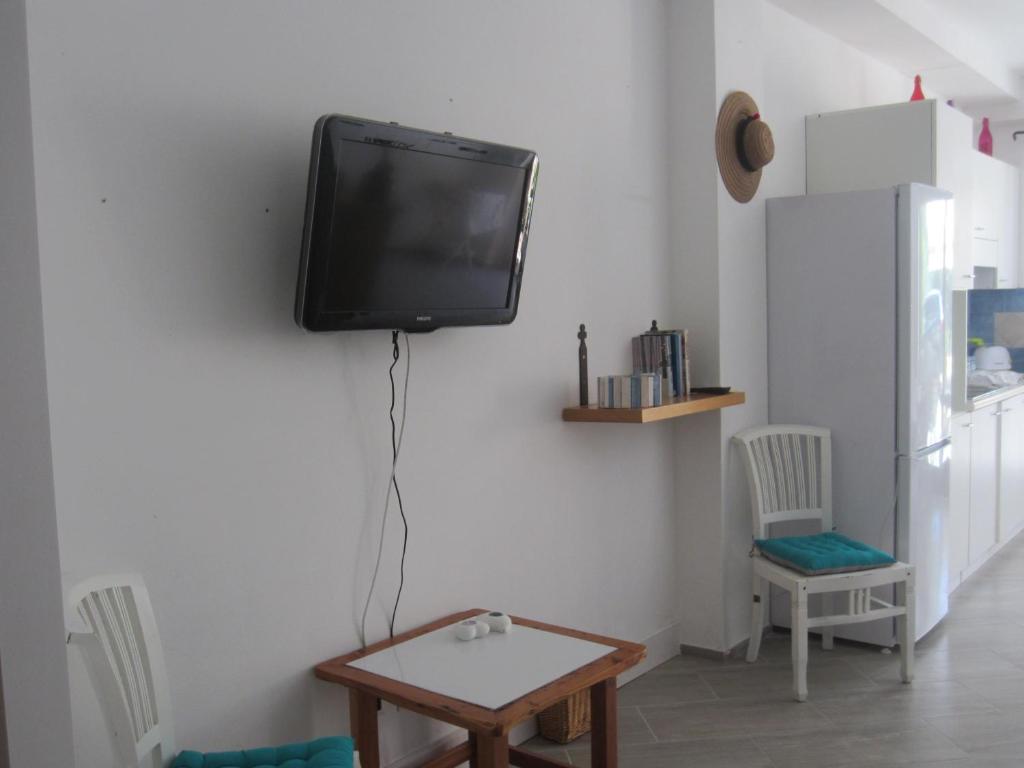 Telewizja i/lub zestaw kina domowego w obiekcie MONOLOCALE SAN PANTALEO