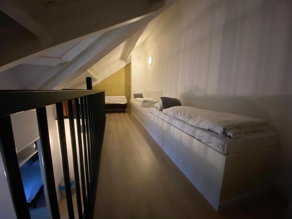 Postel nebo postele na pokoji v ubytování Hotel & Appartementen - De Zeven Heuvelen
