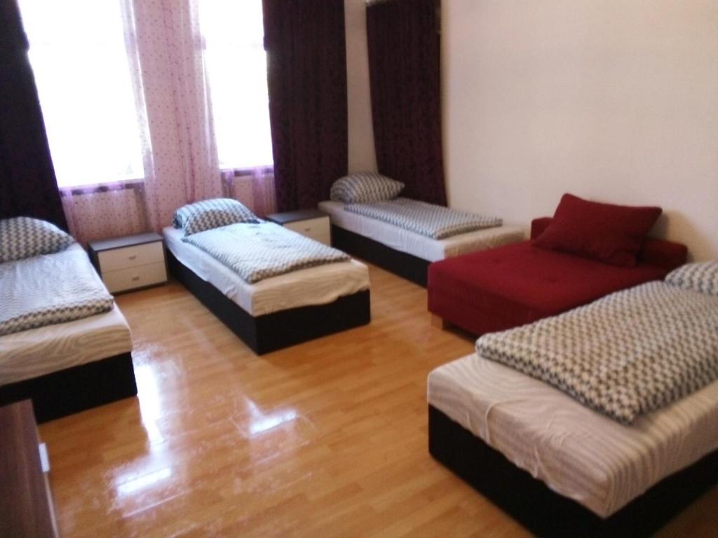 Postel nebo postele na pokoji v ubytování Raisa Apartments Fünkhgasse