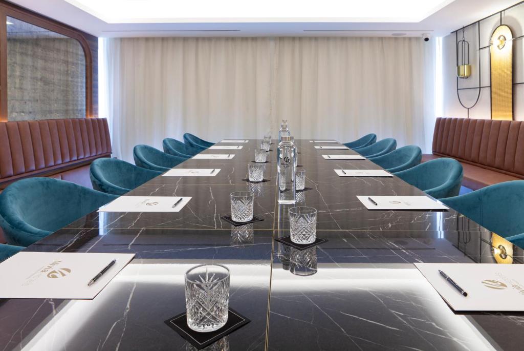 The business area and/or conference room at Nivia Born Boutique Hotel