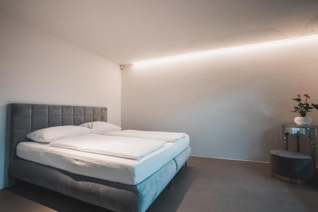 Łóżko lub łóżka w pokoju w obiekcie Montelino Boutiquehouse