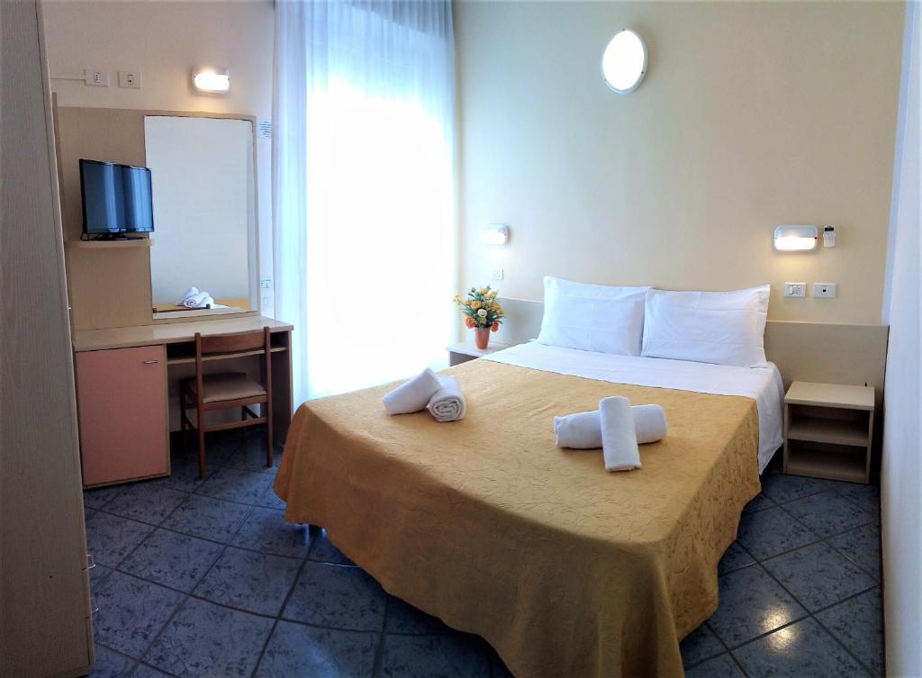 Katil atau katil-katil dalam bilik di Hotel Corona