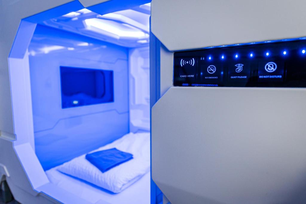 Ένα ή περισσότερα κρεβάτια σε δωμάτιο στο Space Home Apartment - Inner City