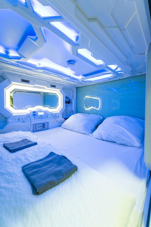 Ένα ή περισσότερα κρεβάτια σε δωμάτιο στο Space Home Apartment - Inner City
