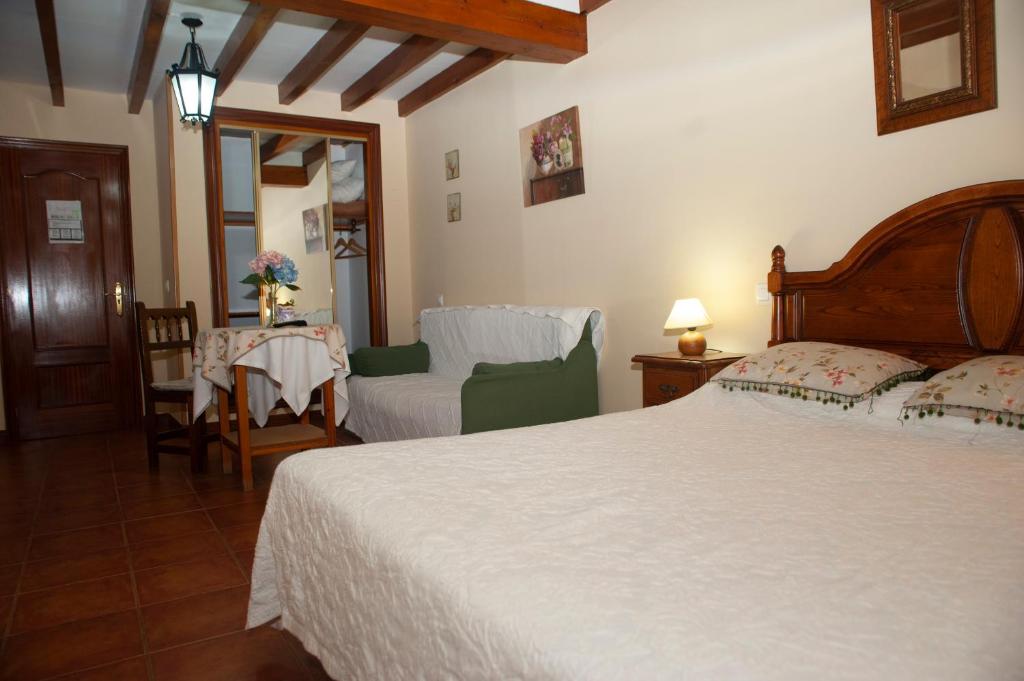 Postel nebo postele na pokoji v ubytování Posada Peñas Arriba