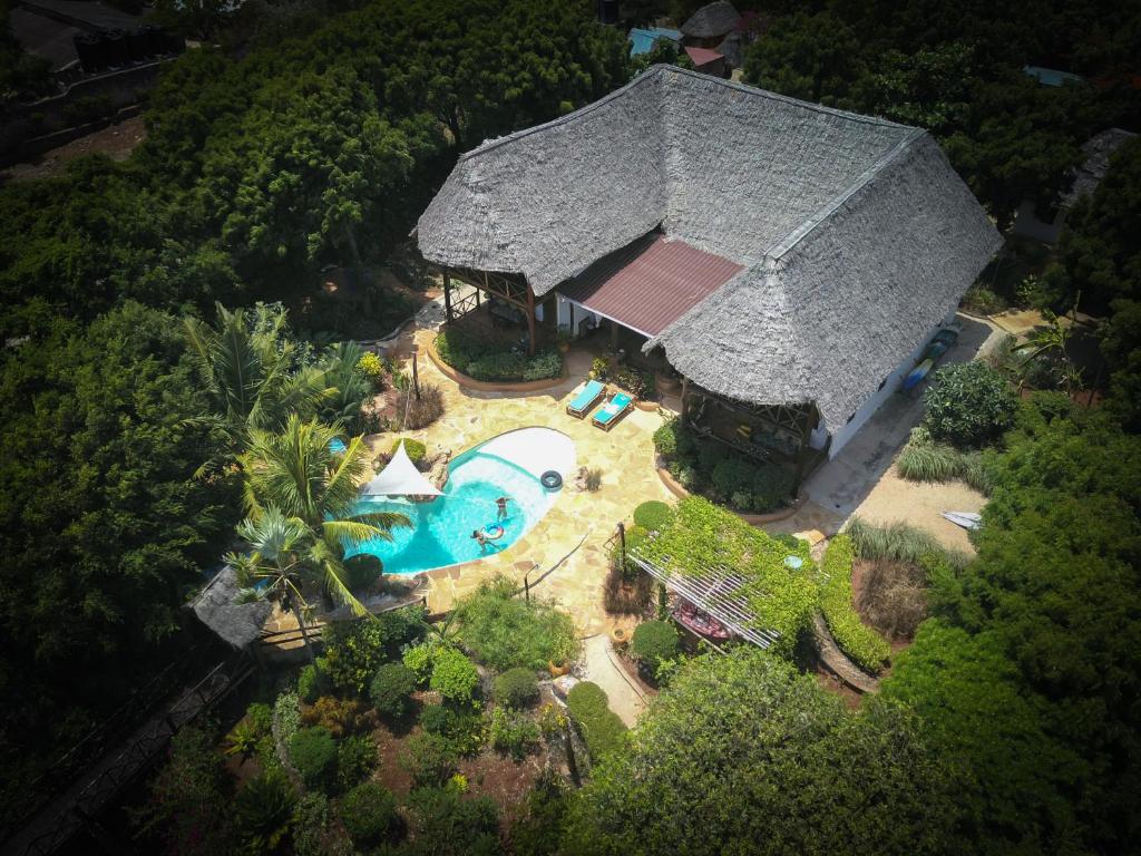 an overhead view of a house with a swimming pool at Che Che Vule by SeVi Exclusive Beach Villa in Matemwe