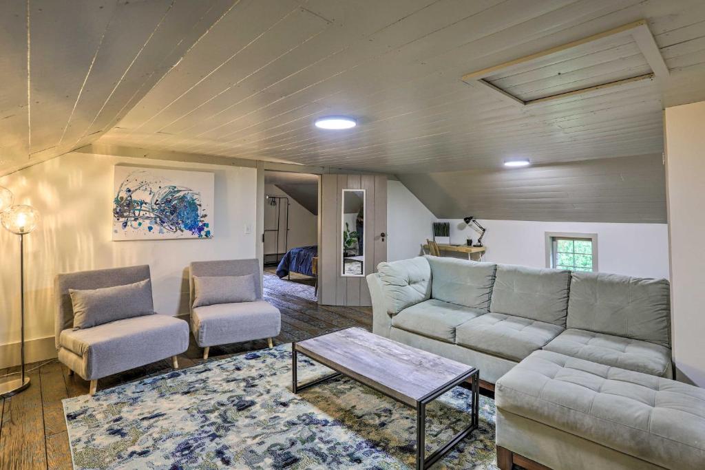 a living room with a couch and two chairs at Timeless Winesburg House with Private Balcony in Dundee