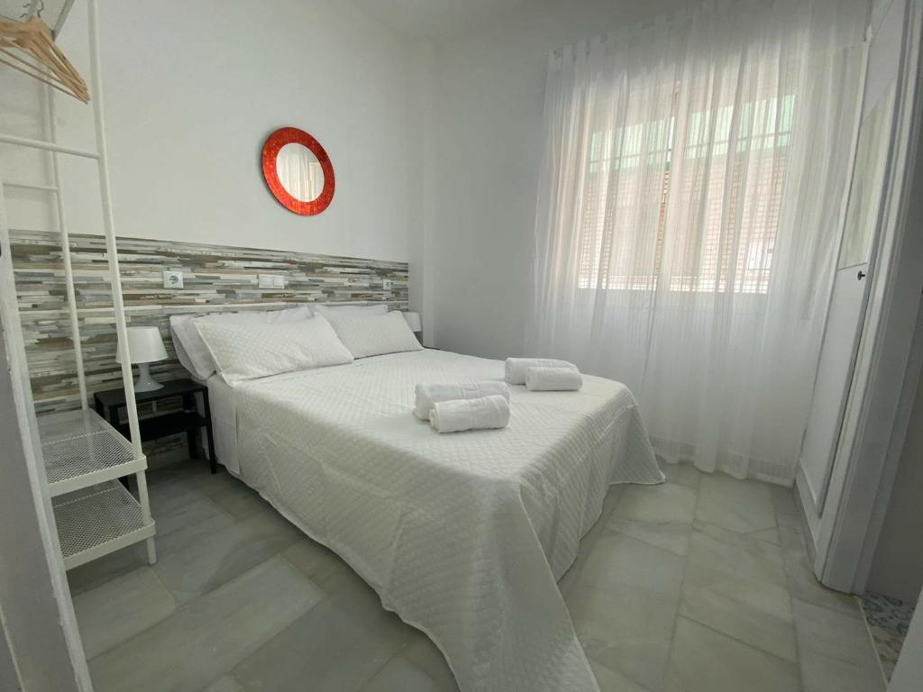Posteľ alebo postele v izbe v ubytovaní Apartamento Pepote