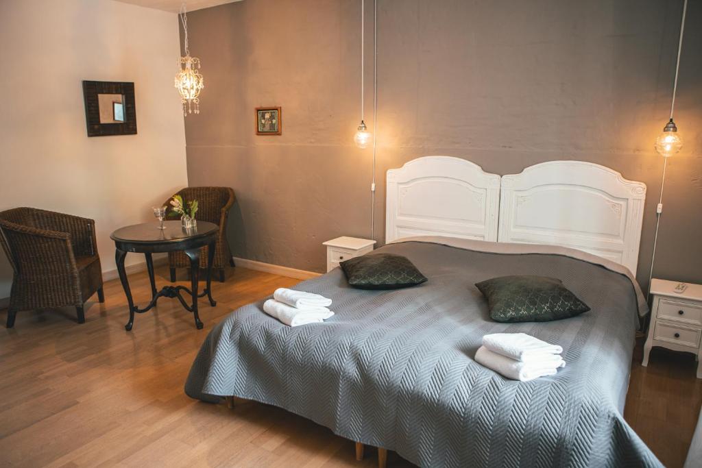 Postel nebo postele na pokoji v ubytování Sonnerupgaard Hotel & Konference