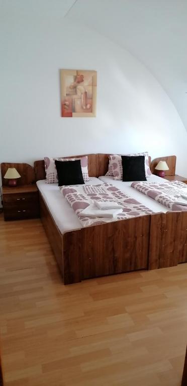 Postel nebo postele na pokoji v ubytování Pension Magnolia
