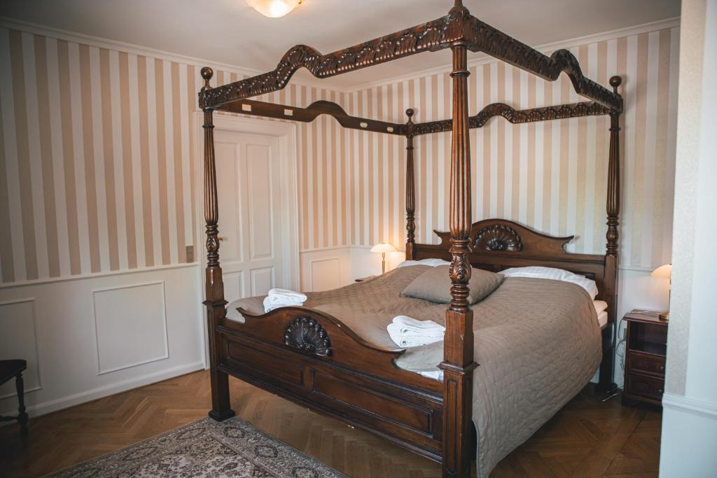 Postel nebo postele na pokoji v ubytování Sonnerupgaard Hotel & Konference