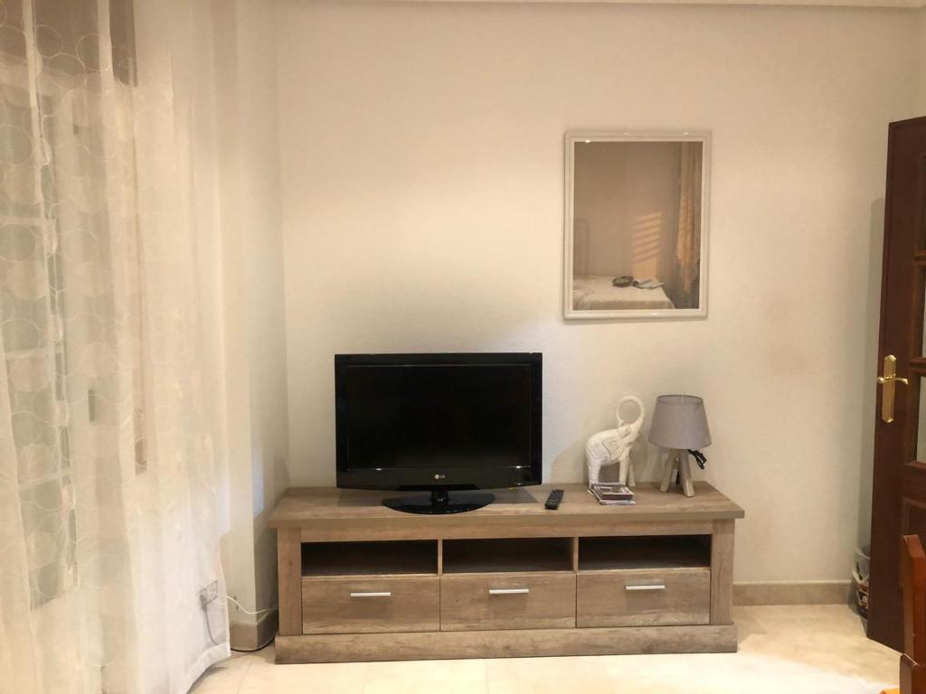 Televízia a/alebo spoločenská miestnosť v ubytovaní LA CASA DEL ESTANCO