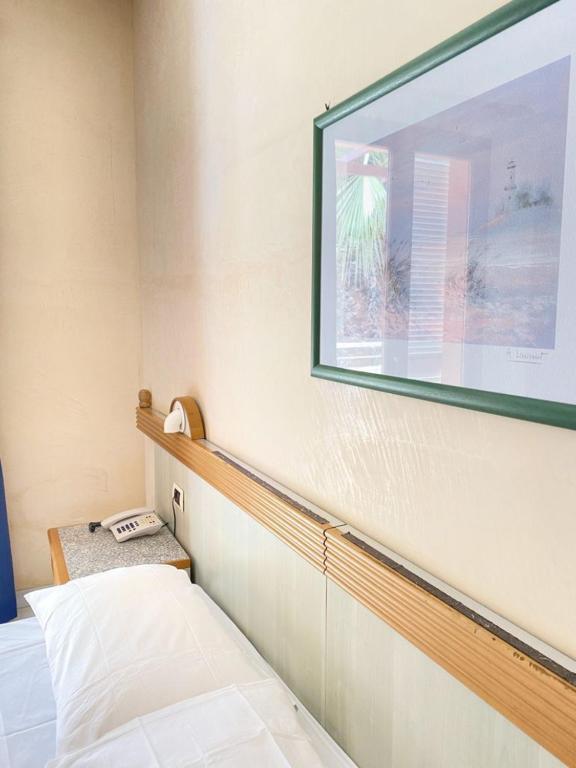 Postel nebo postele na pokoji v ubytování Tramonti Residence