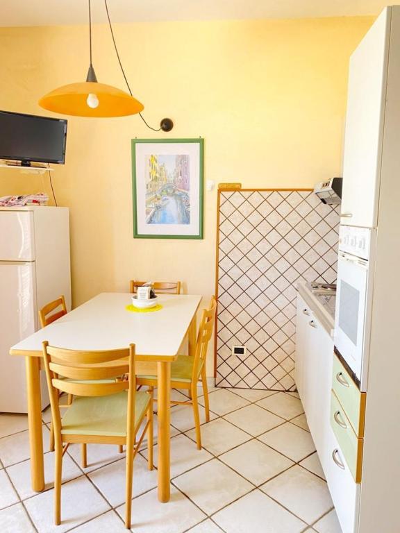 Kuchyň nebo kuchyňský kout v ubytování Tramonti Residence