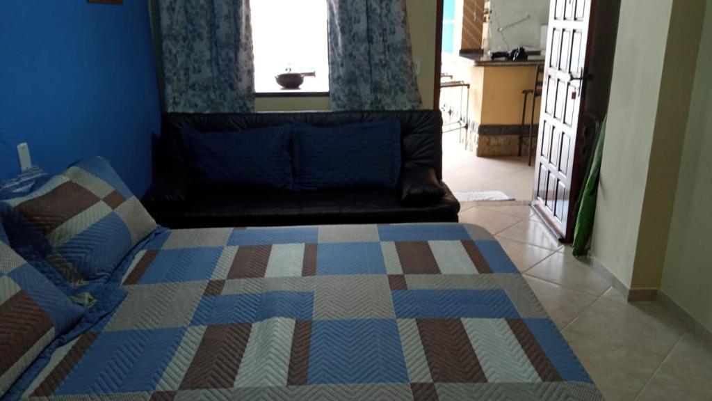 Postel nebo postele na pokoji v ubytování GARATUCAIA - Suites Casa de Madeira