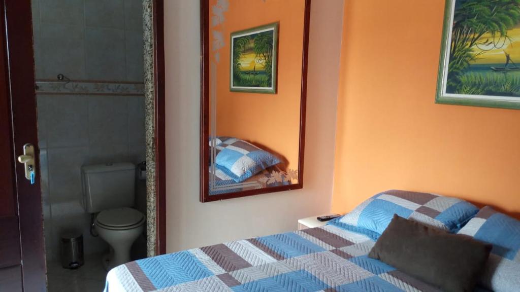 Postel nebo postele na pokoji v ubytování GARATUCAIA - Suites Casa de Madeira