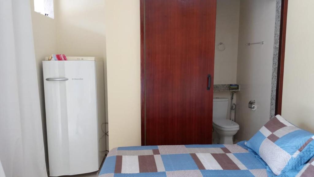 Postel nebo postele na pokoji v ubytování GARATUCAIA - Suites Casa de Madeira