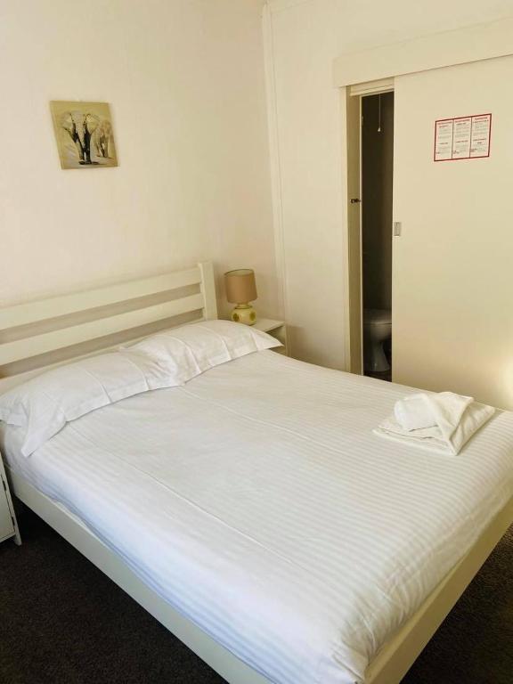 Postel nebo postele na pokoji v ubytování Seawold Guest House