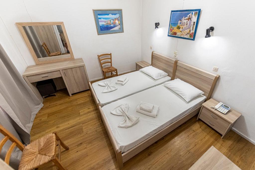 Letto o letti in una camera di Sparta Team Hotel