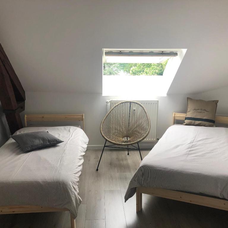 Postel nebo postele na pokoji v ubytování COSY APPART
