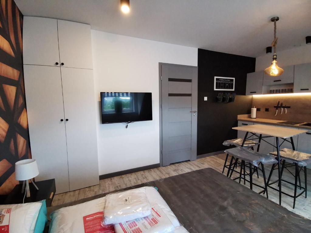 Kuchyňa alebo kuchynka v ubytovaní Apartamenty Majówka