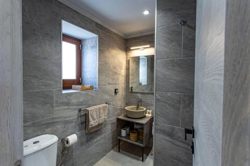 A bathroom at Althea Apartments 2