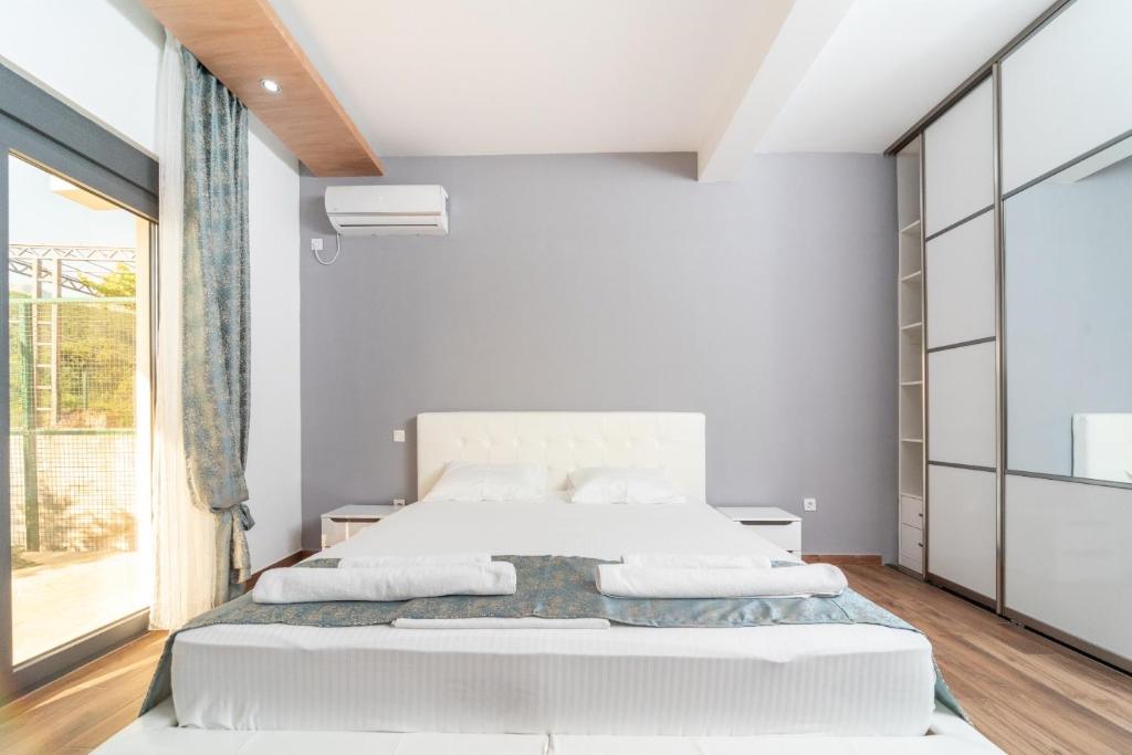 Postel nebo postele na pokoji v ubytování Resort Bevilacqua