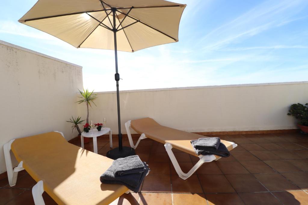 Posedenie v ubytovaní Ohana Beachfront