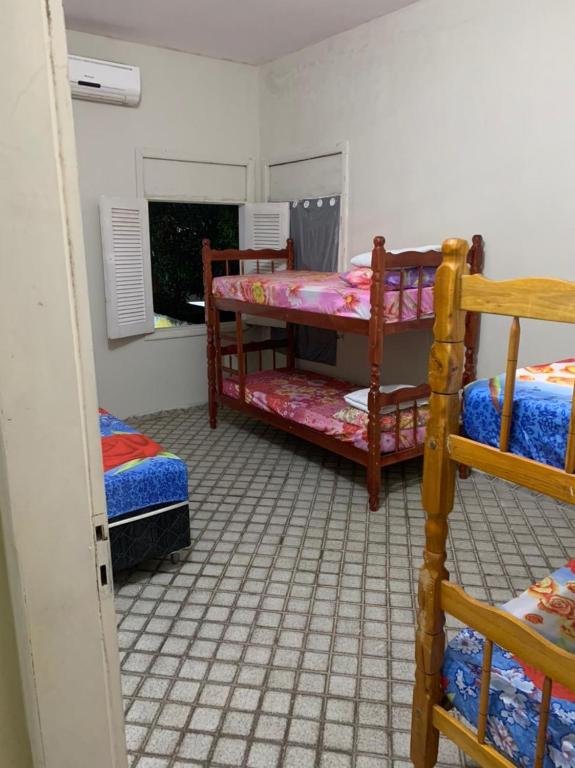 Postel nebo postele na pokoji v ubytování Hostel da Paz