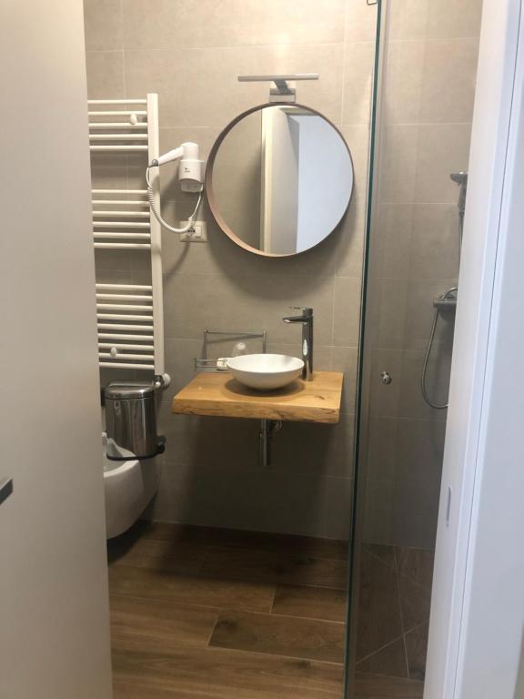 Koupelna v ubytování CAVALIERE suite & rooms