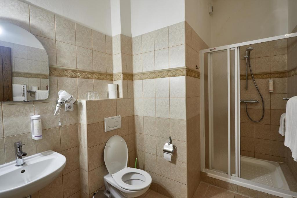 Koupelna v ubytování Vivaldi Apartments