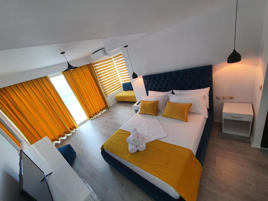 Postel nebo postele na pokoji v ubytování Hotel Aloha
