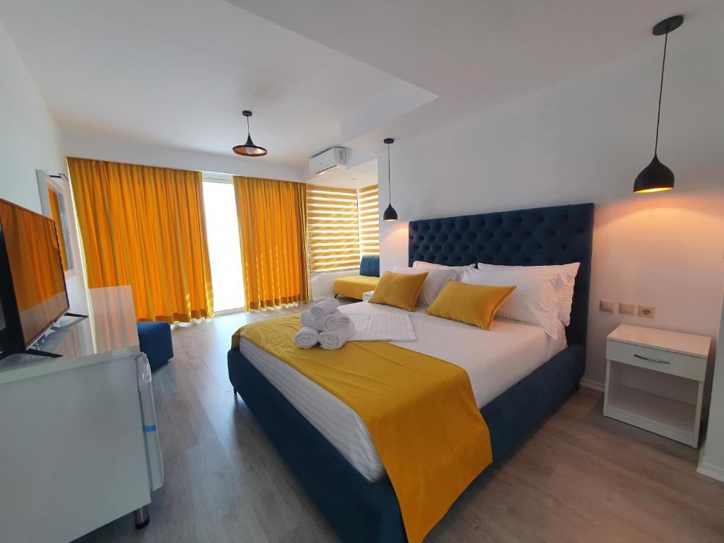 Postel nebo postele na pokoji v ubytování Hotel Aloha