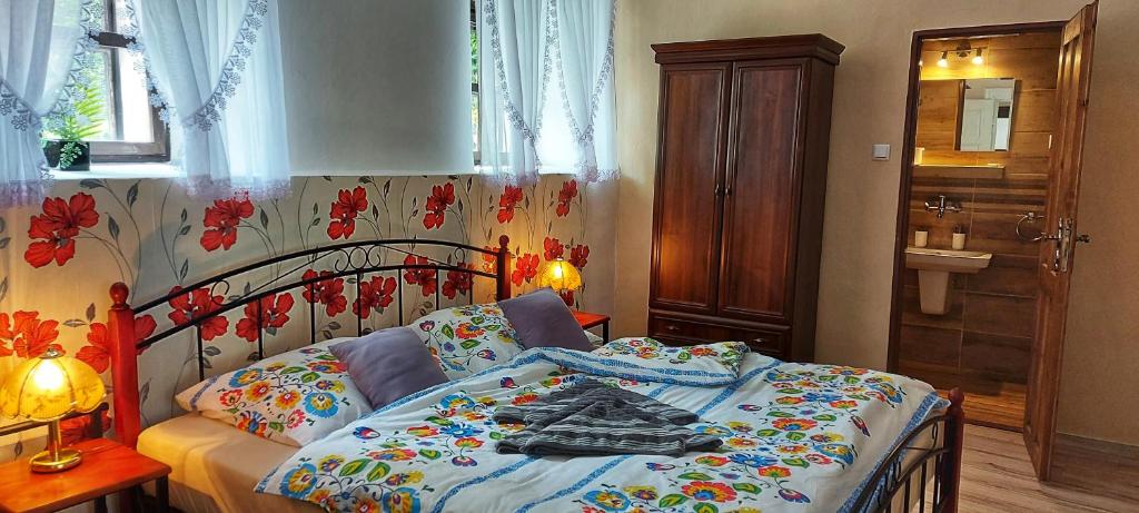 Posteľ alebo postele v izbe v ubytovaní Penzion TOMINO