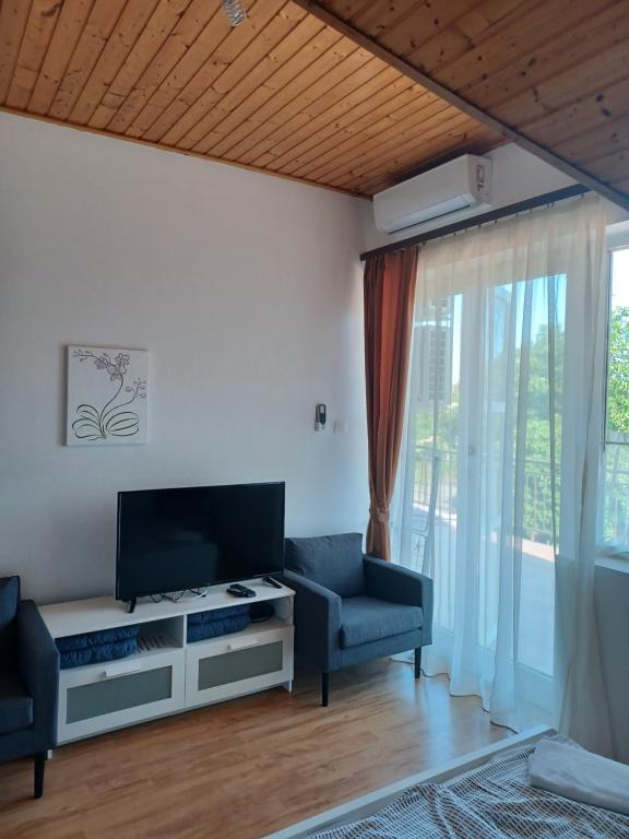 Posezení v ubytování Jankó Apartman