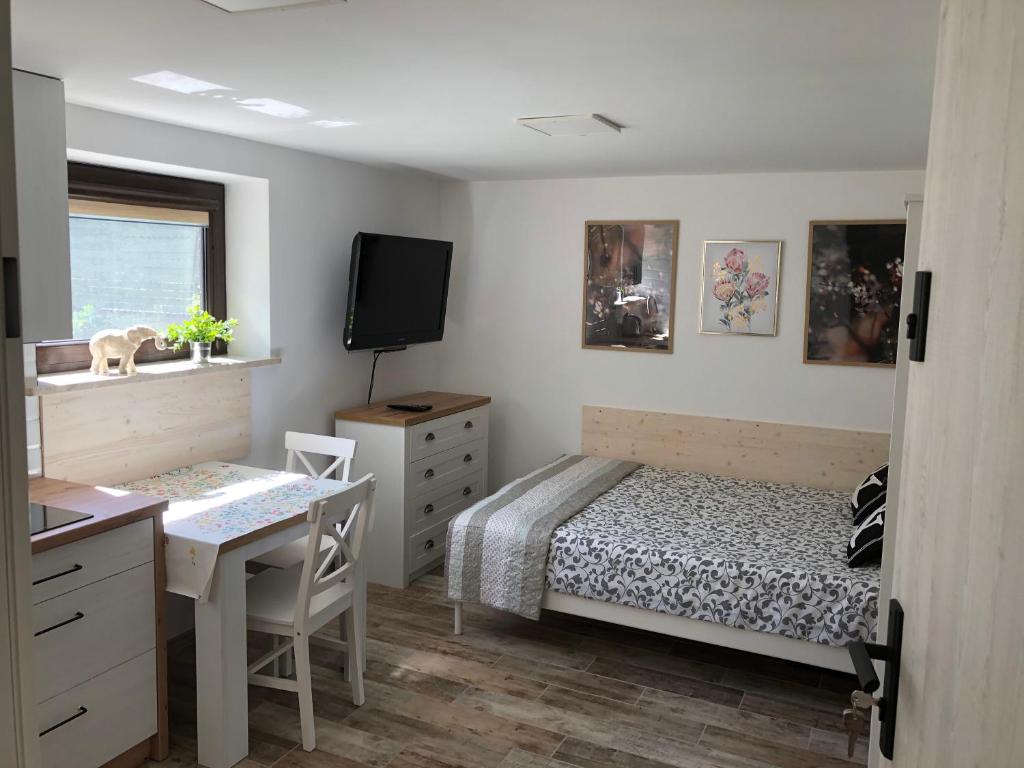 Posteľ alebo postele v izbe v ubytovaní Apartamenty Chris