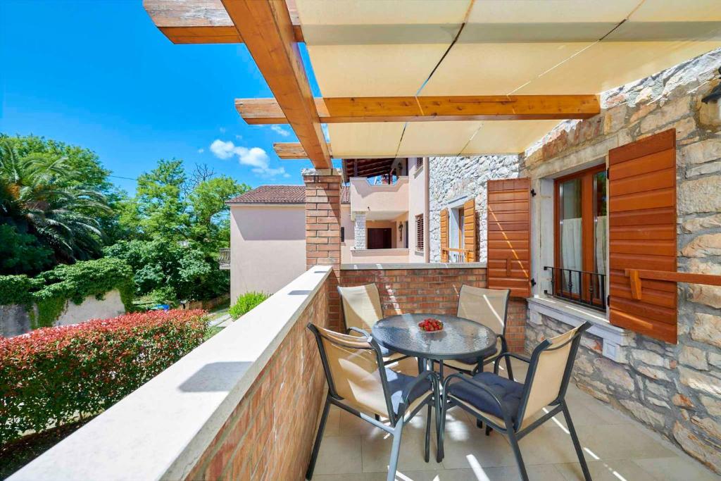 Balkon lub taras w obiekcie Holiday home in Medulin/Istrien 9006