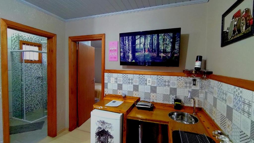 Kuchyň nebo kuchyňský kout v ubytování Cabana Drechsler Gramado